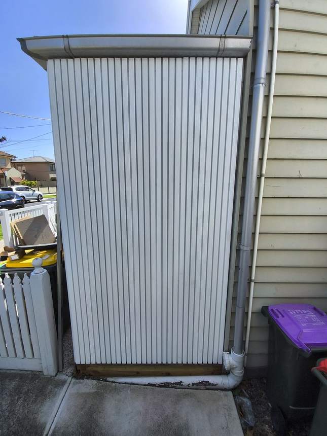 White slatted composite cladding privacy screen — Newport
