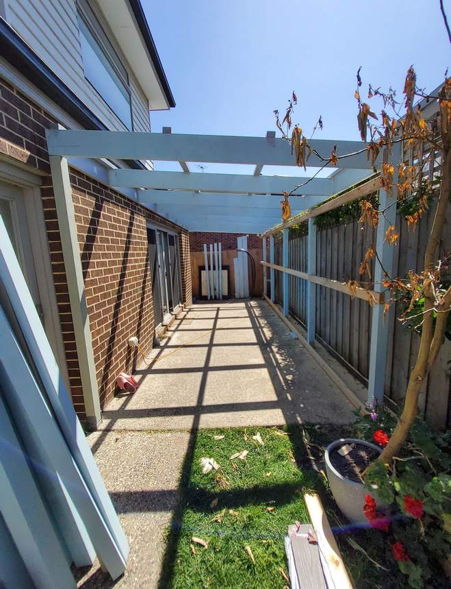 LOSP pine pergola frame taking shape over living zone, Heidelberg