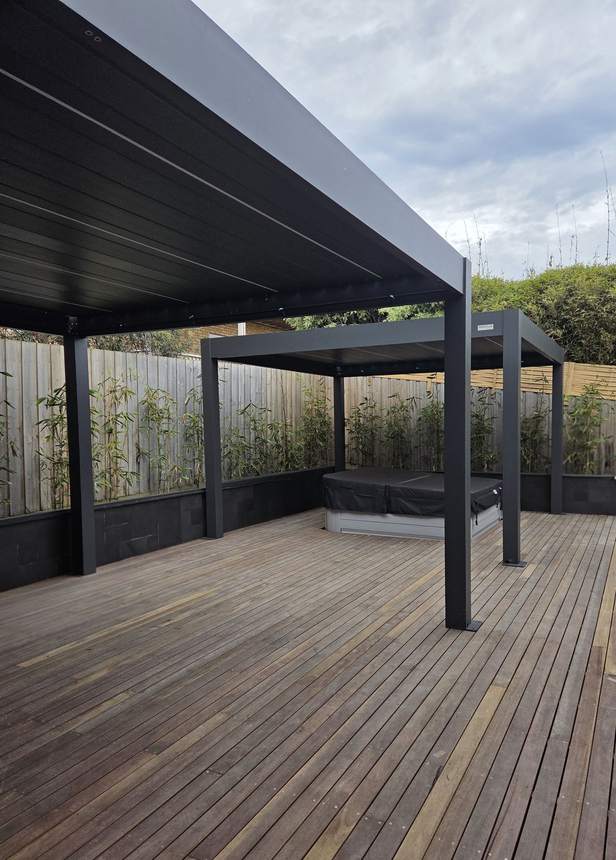 Full merbau deck with both Pergolux pergolas and spa with bamboo behind