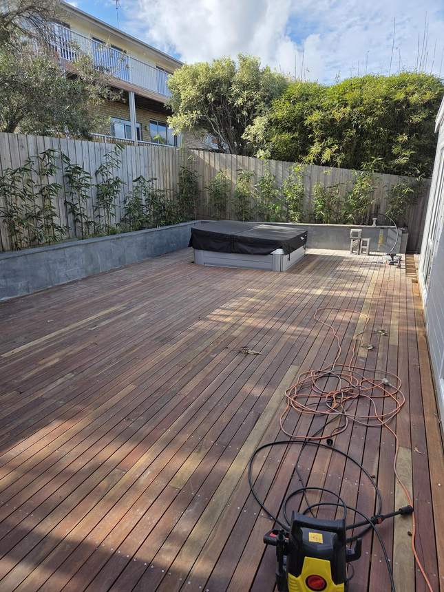 Merbau deck and spa with completed bluestone wall capping visible