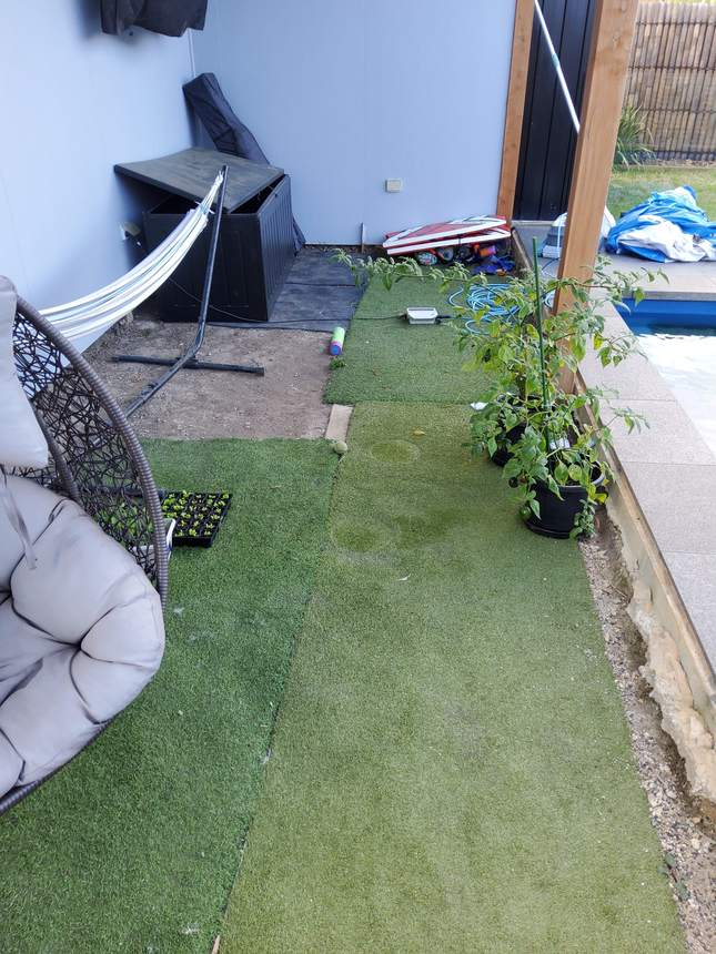 Pool-side area before work — old artificial grass, original staircase, existing furniture — Pakenham