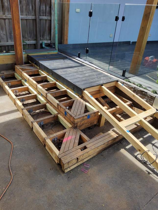 New structural staircase frame alongside the pool — Pakenham