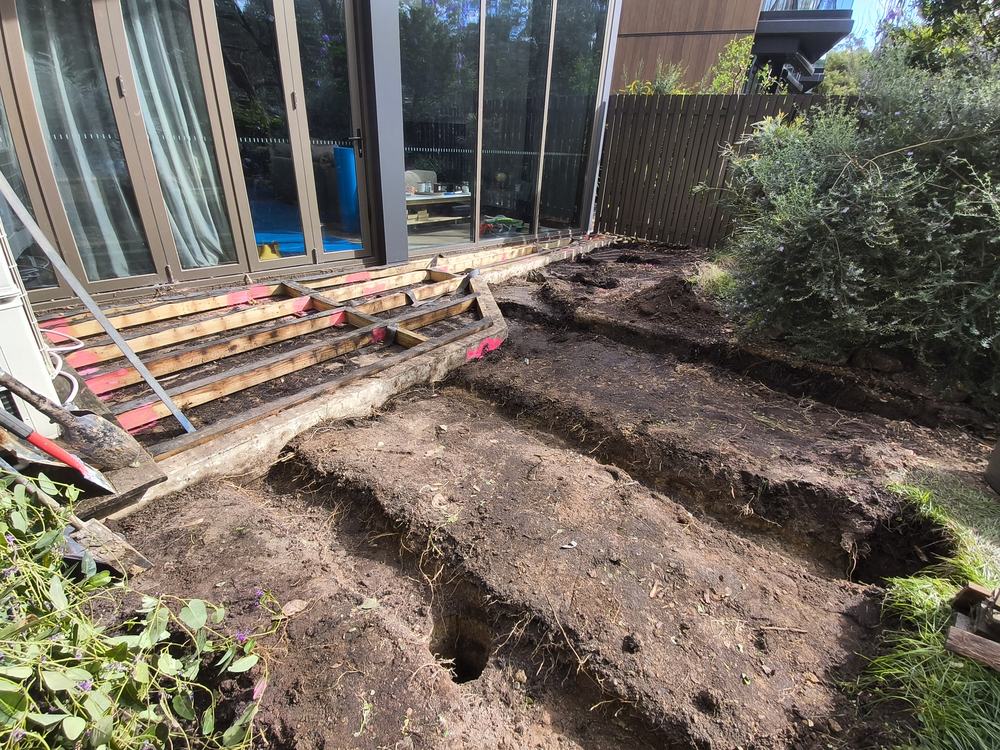 Stump holes and trenches dug for the deck extension frame