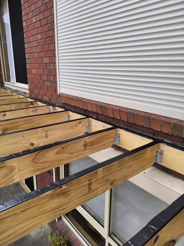Completed subframe — every joist taped, every connection level and square, Seaford