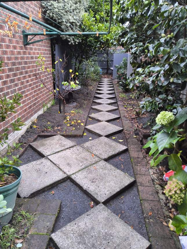 Old uneven pavers running down the side of the house into the garden — Surrey Hills
