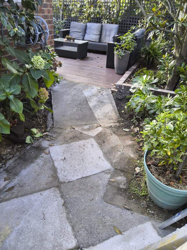 Finished flush brush-textured paving and a step-free ramp into the side garden — Surrey Hills
