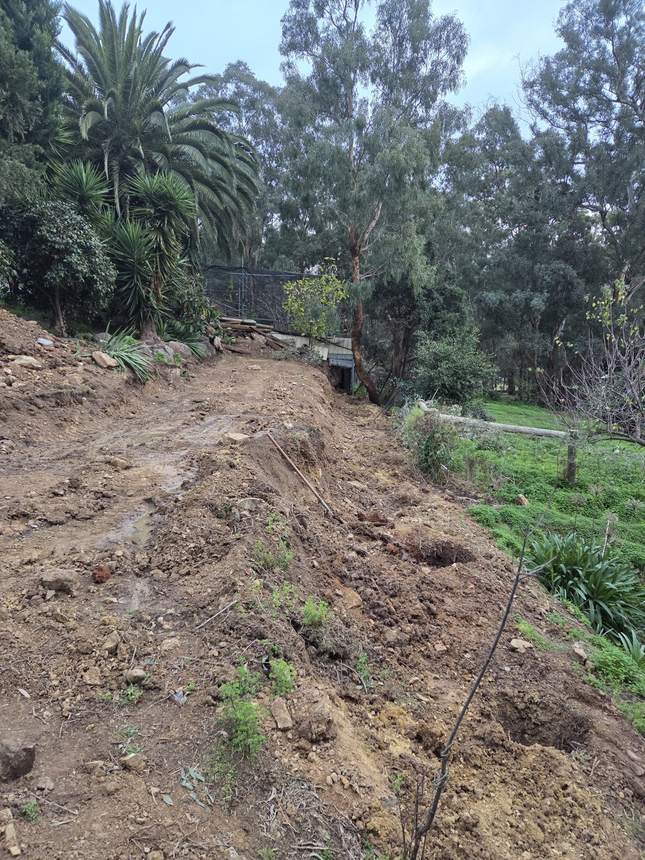 Full run dug out along the boundary, a level base set for footings and posts — Templestowe