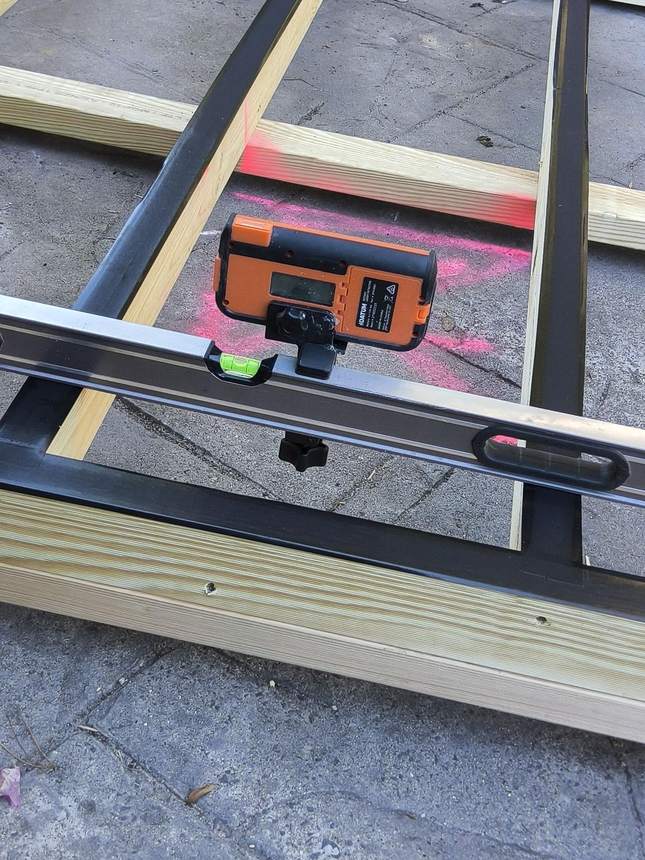 Frame levelled with precision — laser sight confirms perfect datum, Templestowe