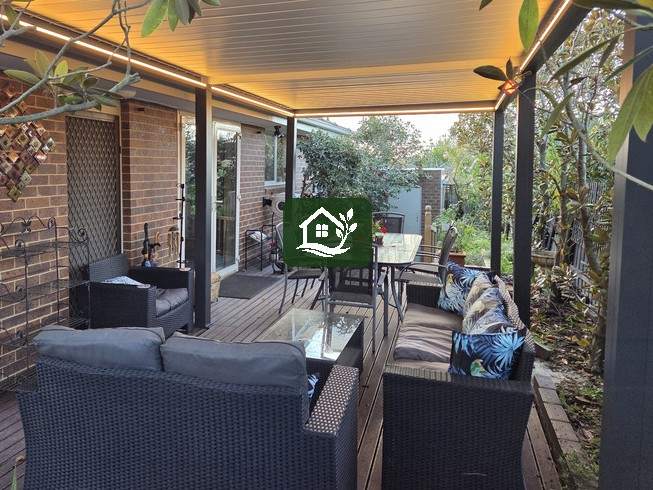 After — Pergolux louvred pergola with lighting over composite deck, Surrey Hills