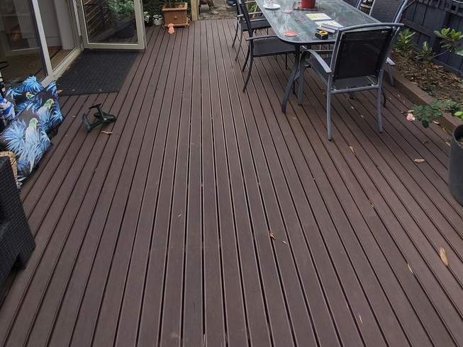 Before — uncovered timber-look deck before pergola, Surrey Hills