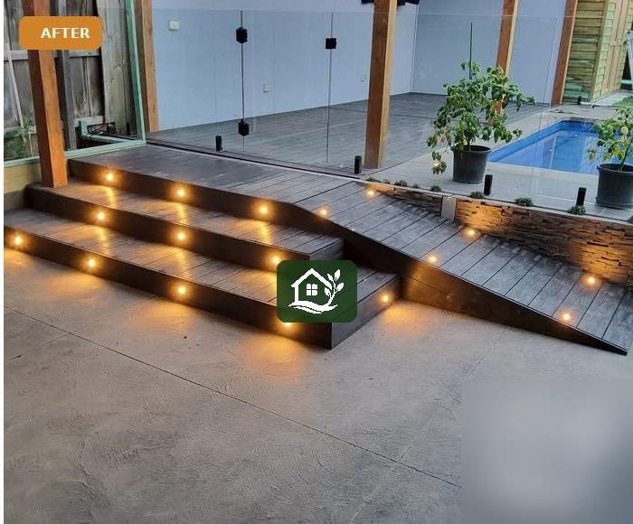 After — pool-side composite deck with lighting